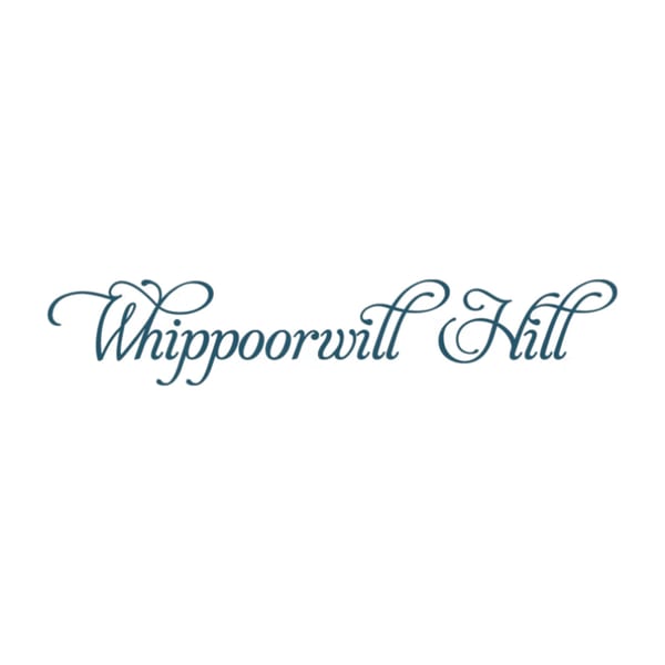 The words "Whippoorwill Hill" in an elegant, flowing blue script on a white background.